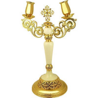 Brass dikiri in gilt with acrylic stem Brass dikiri in gilt with acrylic stem