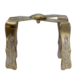 Brass asterisk with fragmentary gilding