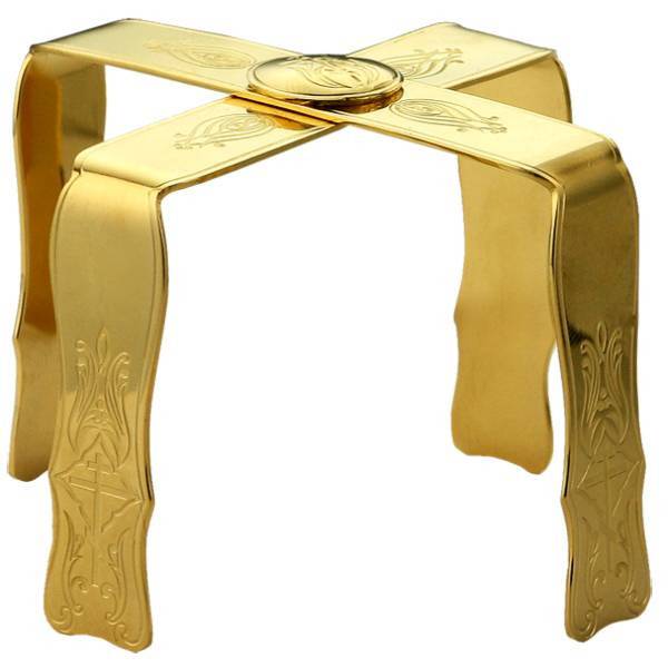 Star of brass with etching in gilt