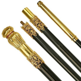 Staff made of gold-plated brass on a wooden base Staff made of gold-plated brass on a wooden base
