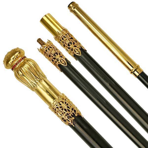 Staff made of gold-plated brass on a wooden base