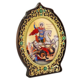 Brass icon of St. George the Victorious on wood in gilding Brass icon of St. George the Victorious on wood in gilding