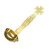 Small pouring ladle made of brass in gilding Small pouring ladle made of brass in gilding