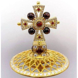 Brass cross on the miter in gilding