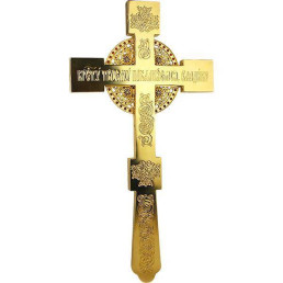 Decorated gilded cross on the altar cross