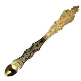 Brass spoon in gilding 