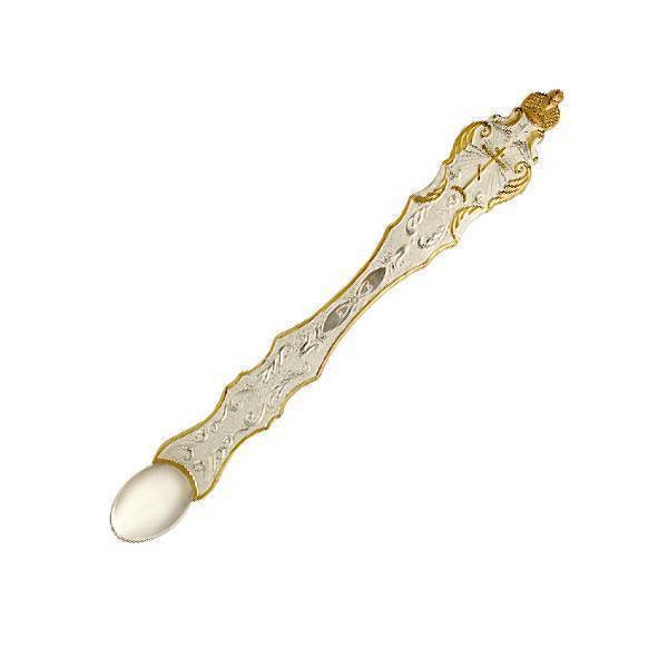 Spoon of brass with fragmentary gilding