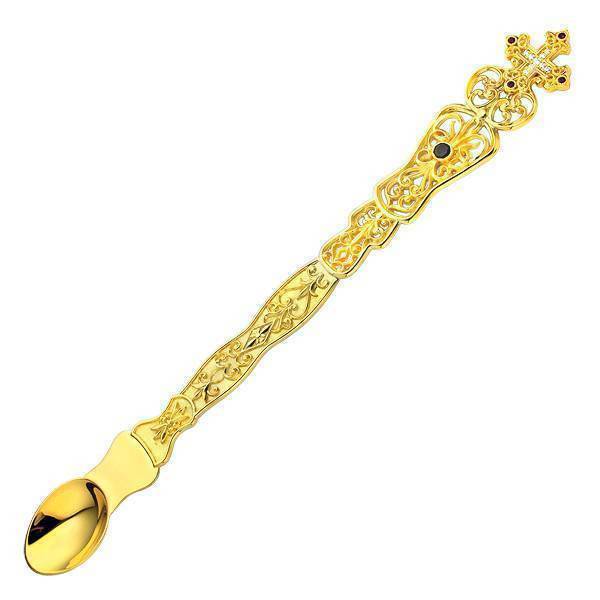 Spoon made of brass in gilt with inlays