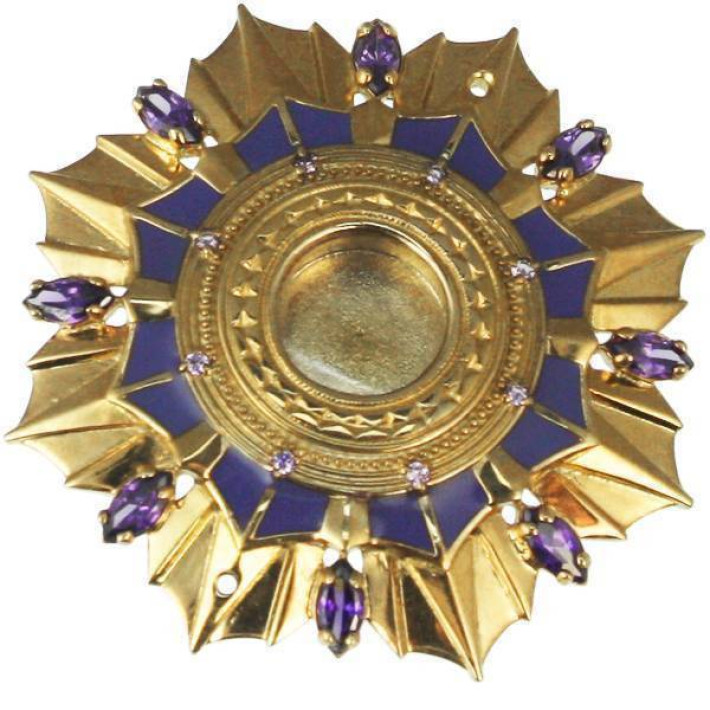 Brass reliquary in gilt with enamel