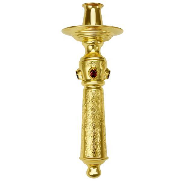 Candlestick with a handle made of gold-plated brass