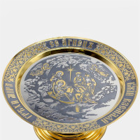 Brass diskos with fragmentary gilding and oxidation