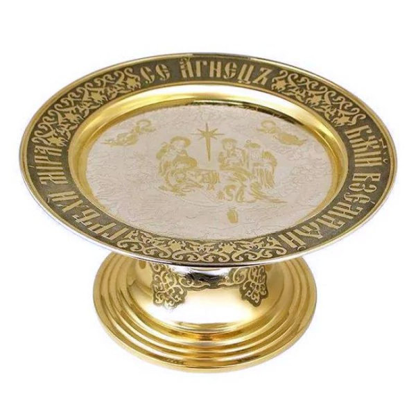 Diskos with a gilded brass with silver plating and blackening