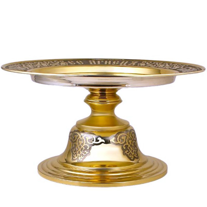 Diskos with a gilded brass with silver plating and blackening