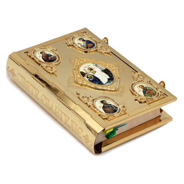 Gospel in a gilded brass frame