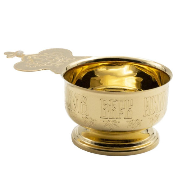 Church ladle on a foot made of brass in gilding