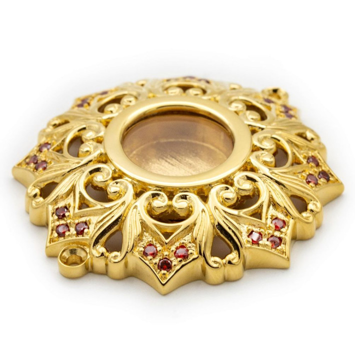 Brass reliquary in gilt