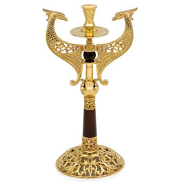 Church candlestick of brass in gilding